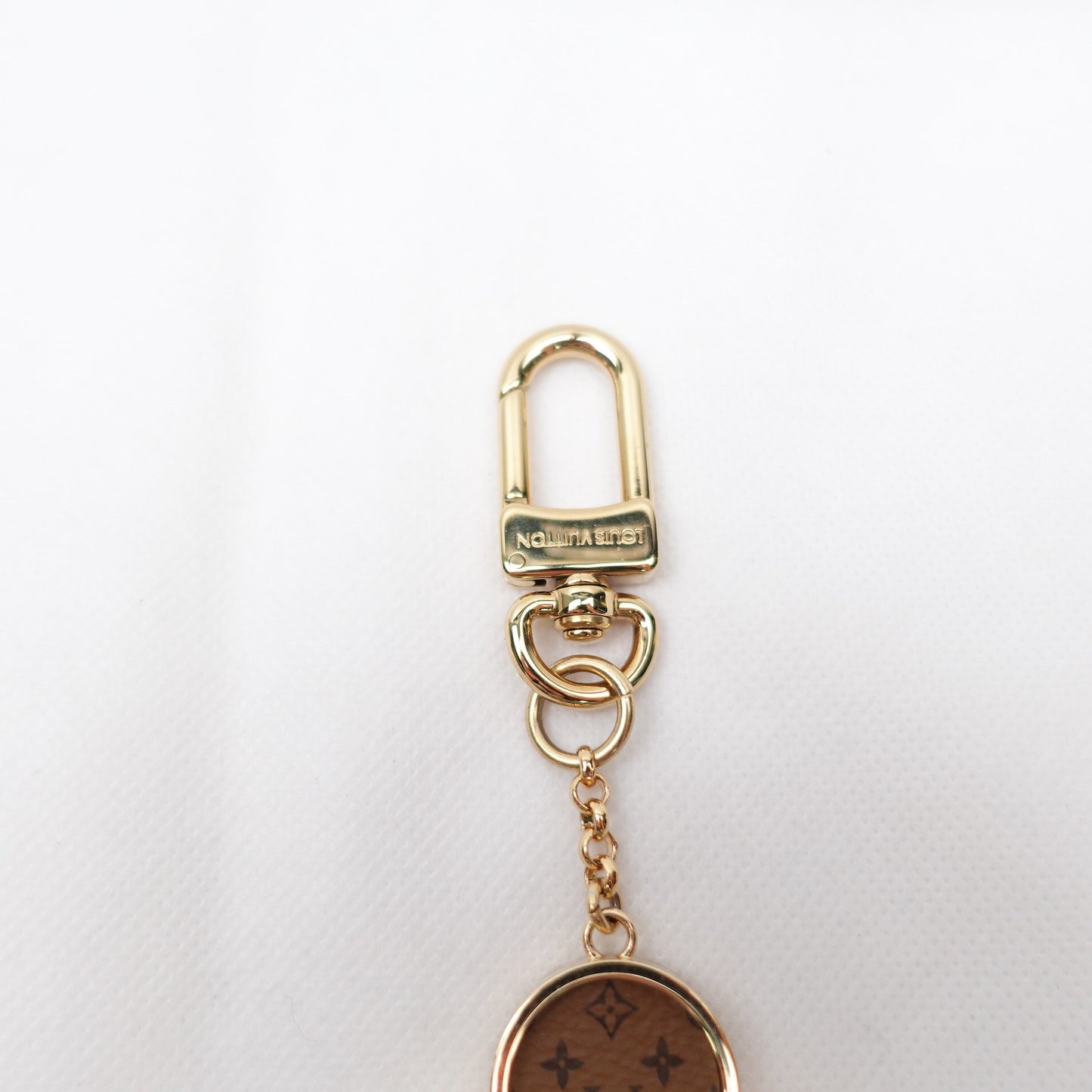 LV Charm T10282222