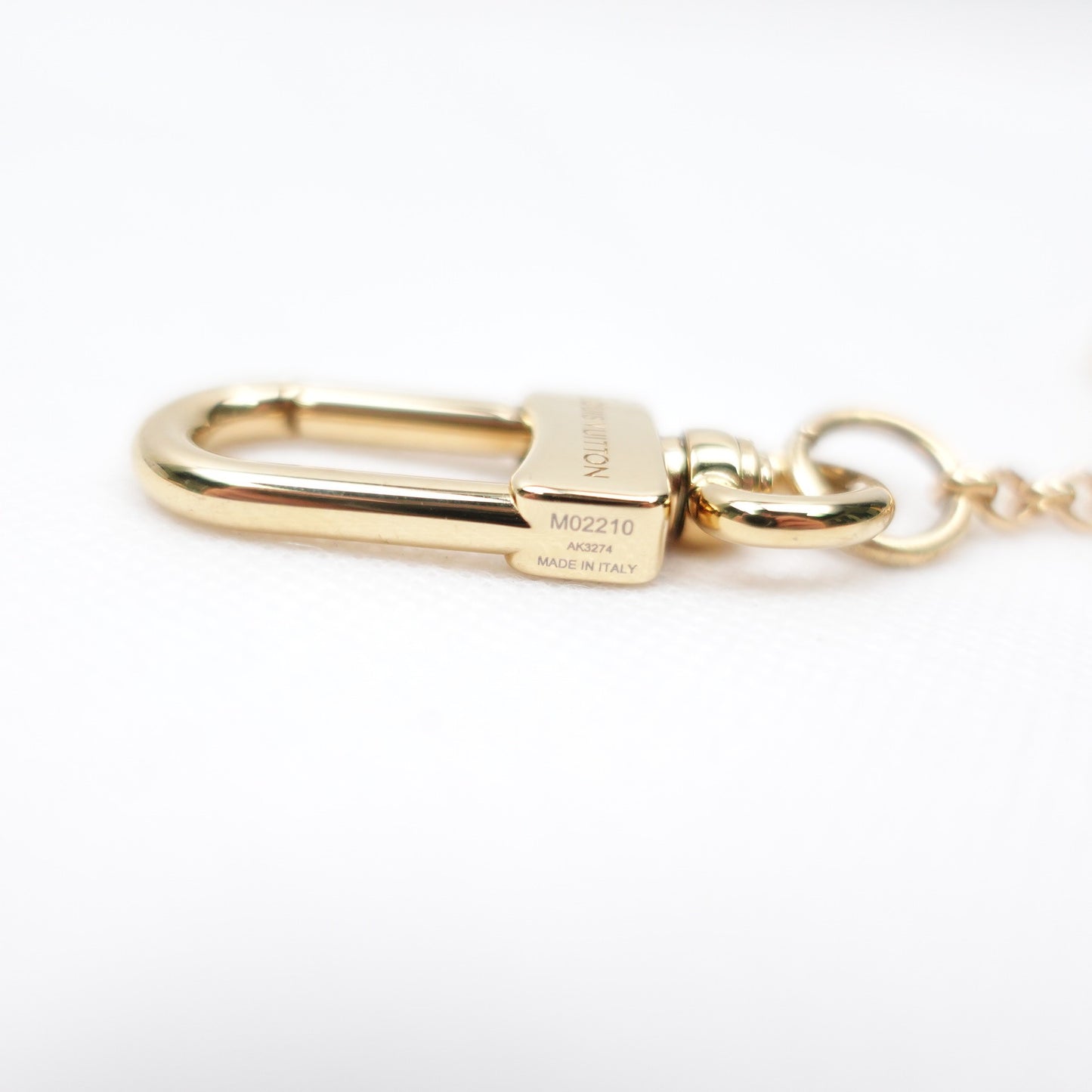 LV Charm T10282222