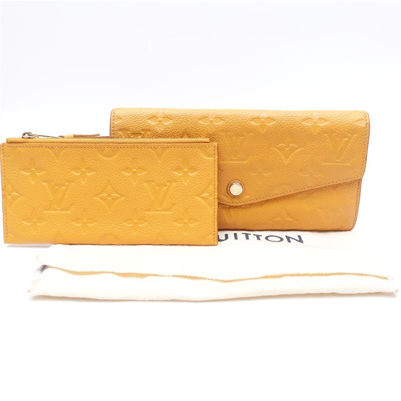 Pre-owned Louis Vuitton Calfskin Small Leather Goods Sarah Yellow Monogram Empreinte Leather Long Wallet