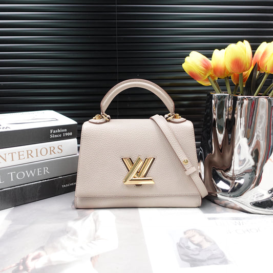 Pre-Owned Louis Vuitton Twist Nude Pink Calfskin Shoulder Bag