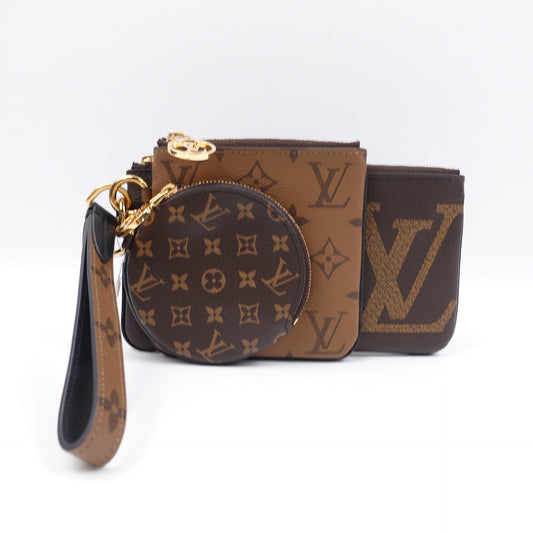 Pre-owned Louis Vuitton Trio Reverse Monogram Coated Canvas Clutch
