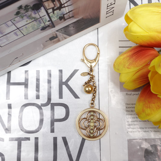 Pre-Owned Louis Vuitton Gold Tone Round Flower Short Bag Charm