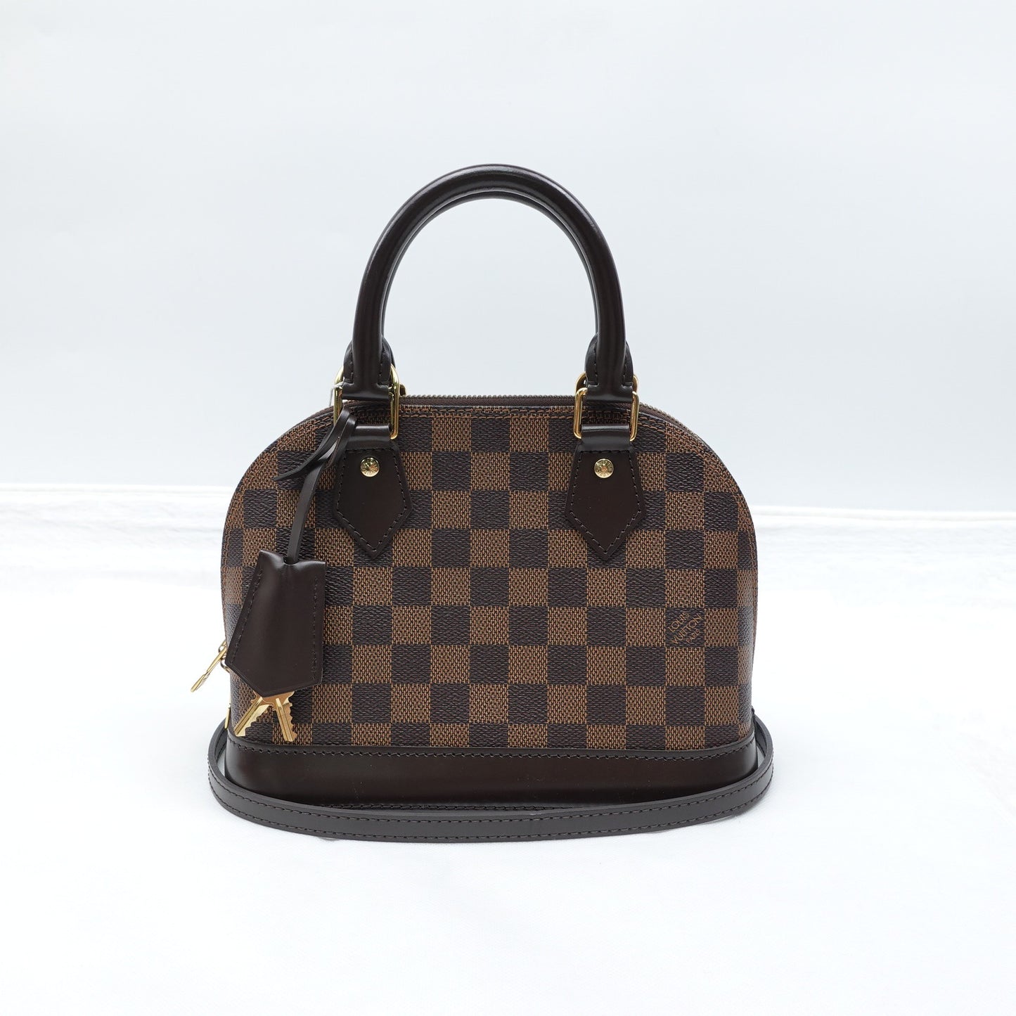 Pre-owned Luis Vuitton Alma BB Damier Ebene Coated Canvas Shoulder Bag