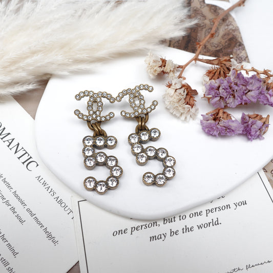 Pre-Owned Chanel Gold-tone Double 5 Diamond Earrings