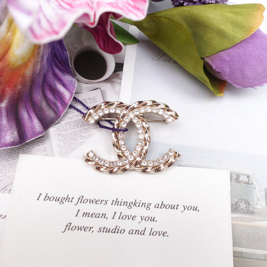 Pre-owned Chanel Gold Crystal Metal Brooch