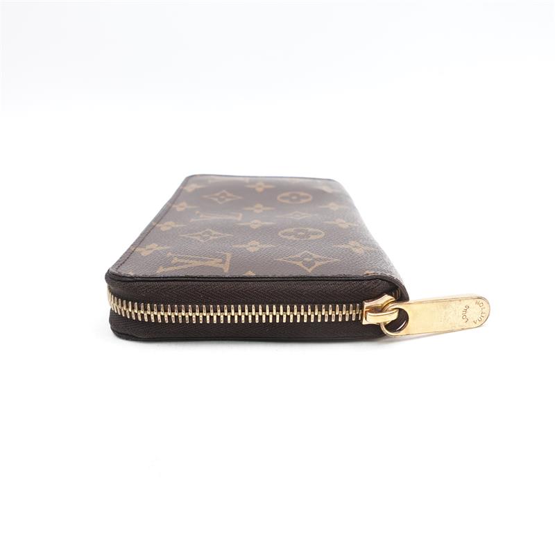 Pre-owned Louis Vuitton Brown Monogram Canvas Zippy wallet